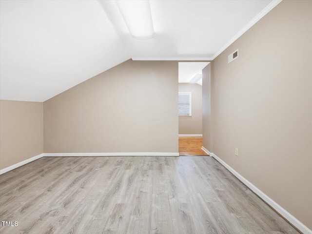 358 Benjie Williams Rd, Staley, NC 27355 - bonus room featuring wood finished floors and vaulted ceiling