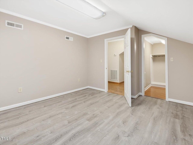 358 Benjie Williams Rd, Staley, NC 27355 - empty room featuring light wood-style floors and lofted ceiling