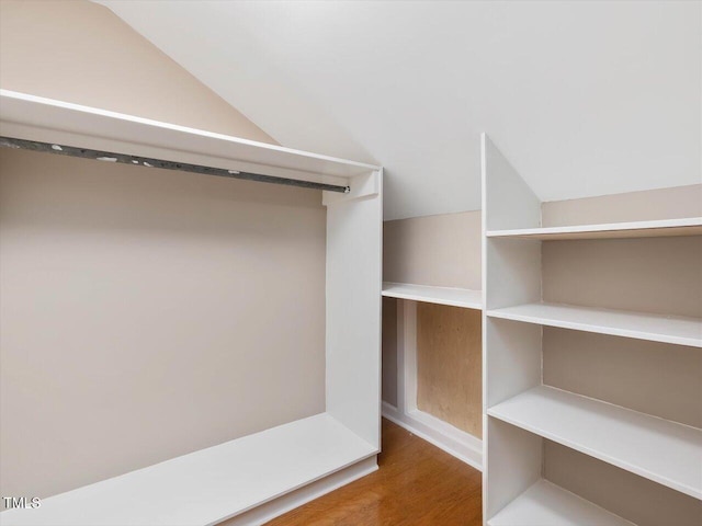 358 Benjie Williams Rd, Staley, NC 27355 - spacious closet featuring lofted ceiling and wood finished floors