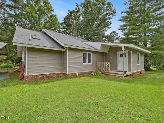 358 Benjie Williams Rd, Staley, NC 27355 - view of front of house with a front lawn and roof with shingles