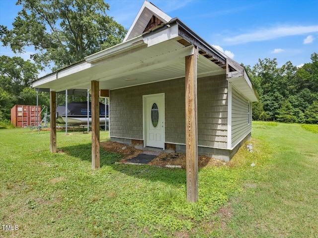 358 Benjie Williams Rd, Staley, NC 27355 - view of front facade with a front lawn and an outbuilding