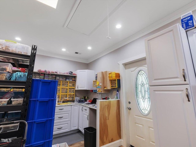 358 Benjie Williams Rd, Staley, NC 27355 - kitchen with ornamental molding, white cabinets, and recessed lighting