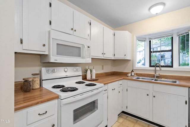 15 Willow Bridge Dr, Durham, NC 27707 - kitchen featuring white appliances, white cabinetry, and light countertops