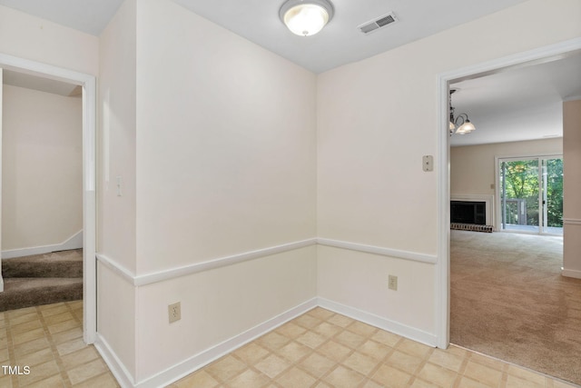 15 Willow Bridge Dr, Durham, NC 27707 - spare room featuring carpet flooring and tile patterned floors