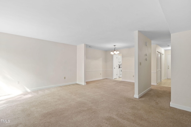 15 Willow Bridge Dr, Durham, NC 27707 - empty room with a chandelier and light carpet