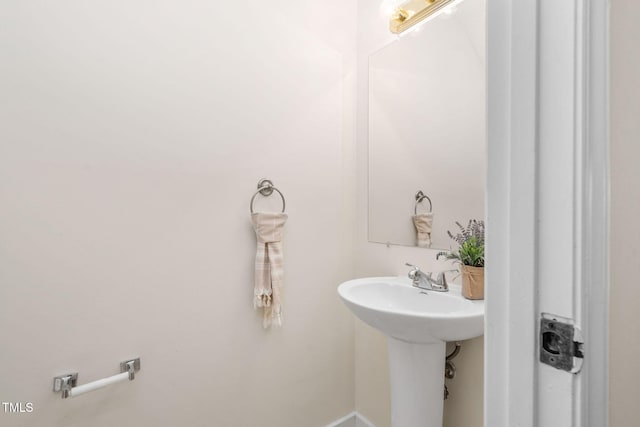 15 Willow Bridge Dr, Durham, NC 27707 - bathroom with a sink and baseboards