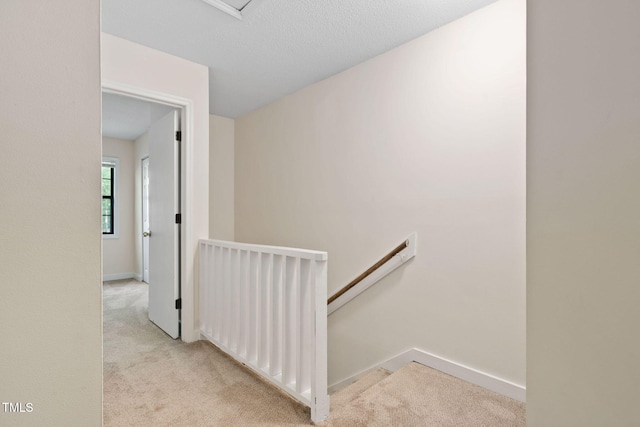 15 Willow Bridge Dr, Durham, NC 27707 - stairway featuring carpet floors and baseboards