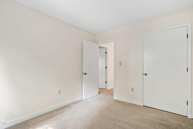 15 Willow Bridge Dr, Durham, NC 27707 - unfurnished bedroom featuring carpet flooring and baseboards
