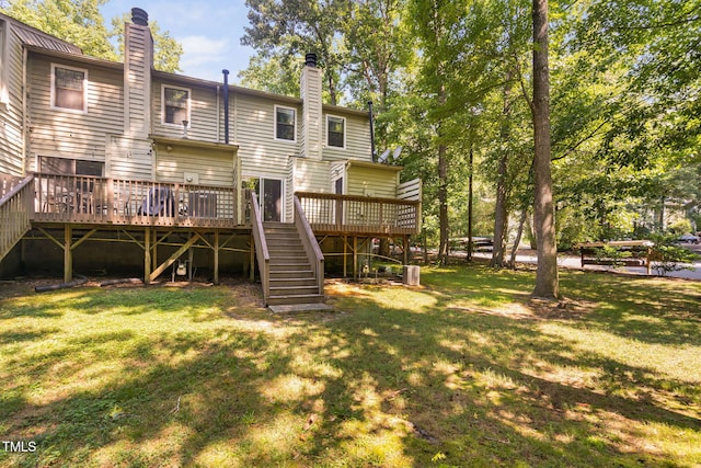 15 Willow Bridge Dr, Durham, NC 27707 - rear view of property featuring stairway, a chimney, a wooden deck, and a yard