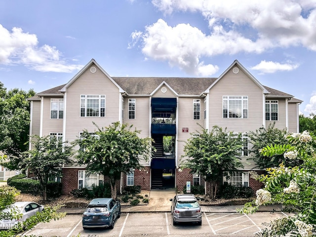 2520 Friedland Pl Unit 200, Raleigh, NC 27617 - view of building exterior with uncovered parking