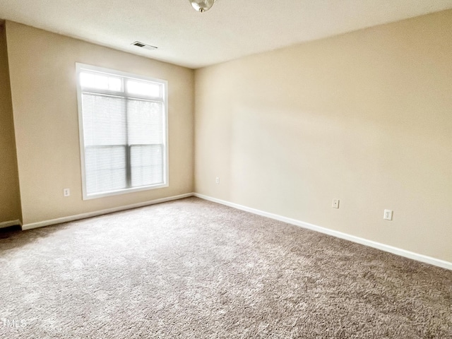 2520 Friedland Pl Unit 200, Raleigh, NC 27617 - spare room with carpet and baseboards