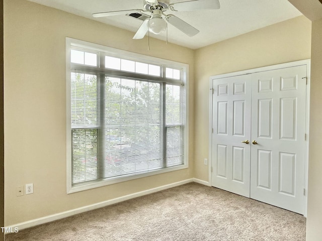 2520 Friedland Pl Unit 200, Raleigh, NC 27617 - unfurnished bedroom featuring carpet floors, a closet, and ceiling fan