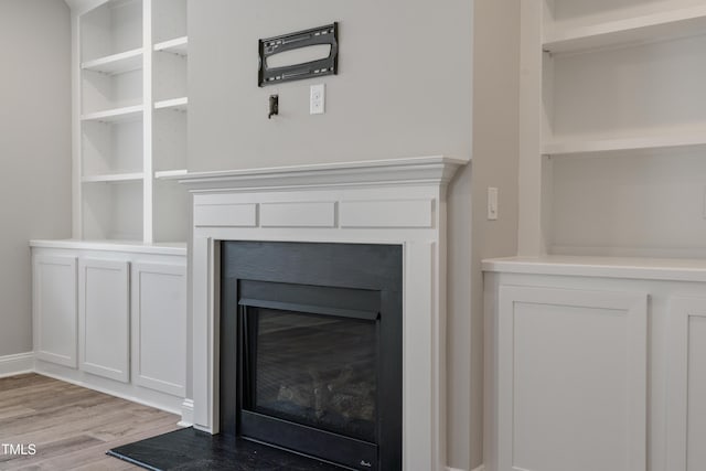 165 Naples Ln, Clayton, NC 27527 - detailed view of wood finished floors and a fireplace