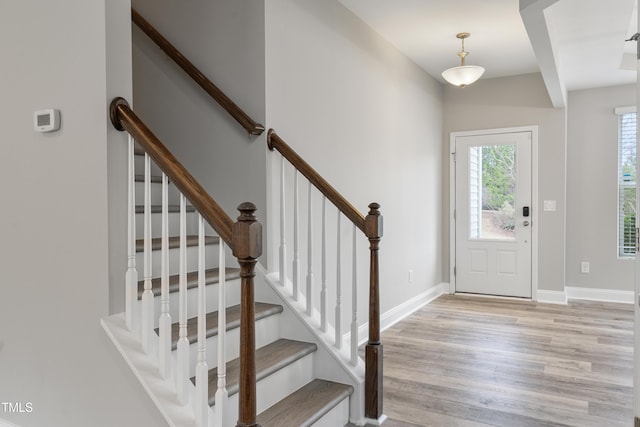 165 Naples Ln, Clayton, NC 27527 - entryway with light wood-style flooring and stairs