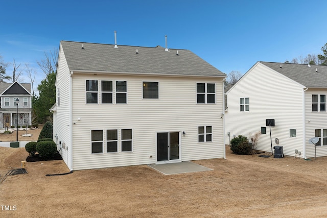 165 Naples Ln, Clayton, NC 27527 - rear view of house featuring a patio and a shingled roof