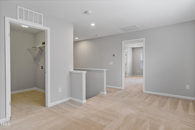 165 Naples Ln, Clayton, NC 27527 - spare room with a smoke detector, light colored carpet, and recessed lighting