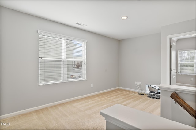 165 Naples Ln, Clayton, NC 27527 - spare room with light carpet and recessed lighting