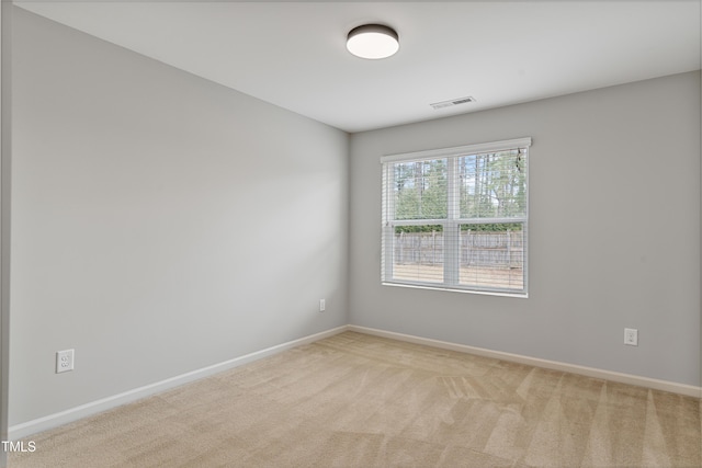 165 Naples Ln, Clayton, NC 27527 - spare room featuring light colored carpet and baseboards