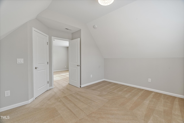 165 Naples Ln, Clayton, NC 27527 - additional living space featuring vaulted ceiling and light colored carpet