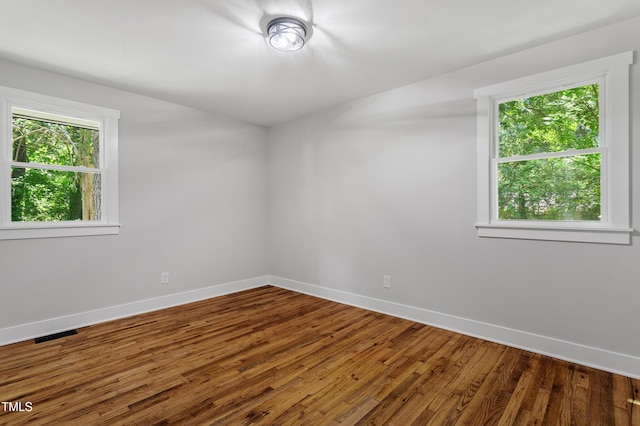 833 Brigham Rd, Raleigh, NC 27610 - empty room featuring baseboards and wood finished floors