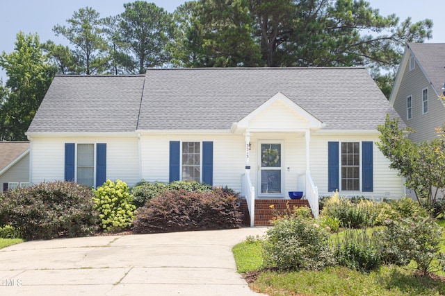 3213 Planet Dr, Raleigh, NC 27604 - view of front of home featuring concrete driveway and a shingled roof