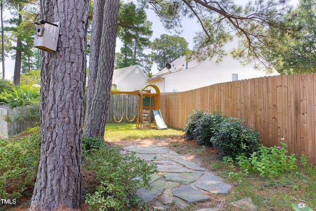 3213 Planet Dr, Raleigh, NC 27604 - fenced backyard featuring a playground