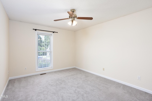 3213 Planet Dr, Raleigh, NC 27604 - spare room with carpet floors and a ceiling fan