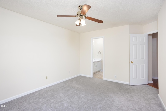 3213 Planet Dr, Raleigh, NC 27604 - unfurnished bedroom with carpet floors, ensuite bathroom, and a ceiling fan