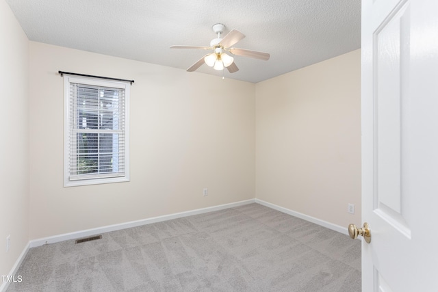 3213 Planet Dr, Raleigh, NC 27604 - carpeted empty room with ceiling fan and a textured ceiling