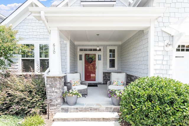 630 Heartland Flyer Dr, Knightdale, NC 27545 - doorway to property featuring covered porch