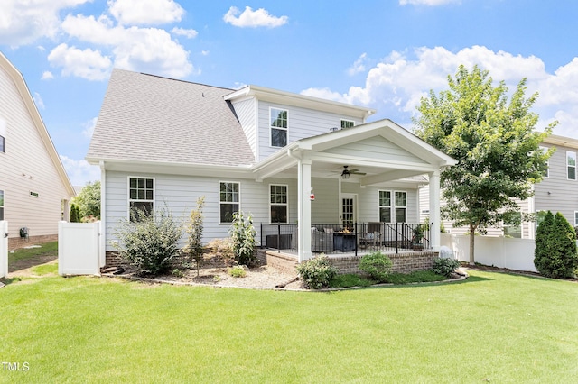 630 Heartland Flyer Dr, Knightdale, NC 27545 - back of property with ceiling fan, a shingled roof, and a patio