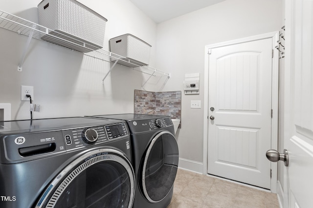 630 Heartland Flyer Dr, Knightdale, NC 27545 - washroom featuring washer and dryer and light tile patterned floors