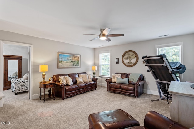 630 Heartland Flyer Dr, Knightdale, NC 27545 - living area with ceiling fan, healthy amount of natural light, and carpet floors