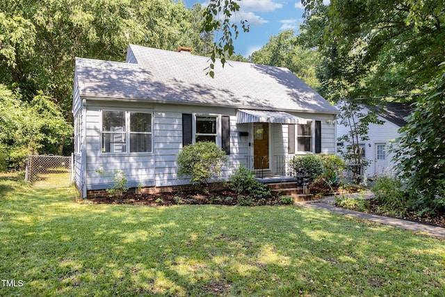 1701 Ruffin St, Durham, NC 27701 - view of front of property featuring a shingled roof and a chimney