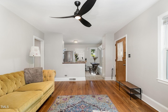 1701 Ruffin St, Durham, NC 27701 - living area with ceiling fan and wood finished floors
