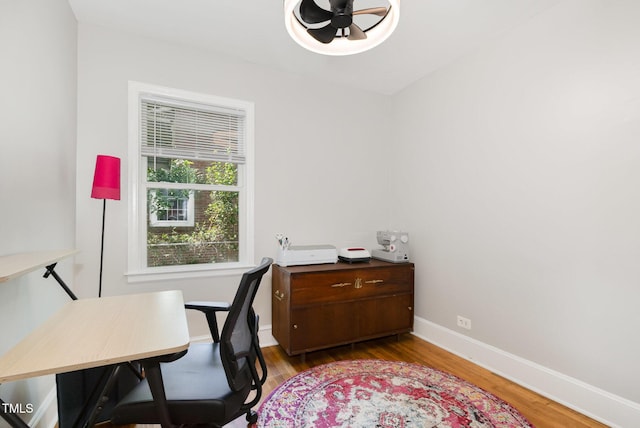 1701 Ruffin St, Durham, NC 27701 - home office with a ceiling fan and wood finished floors
