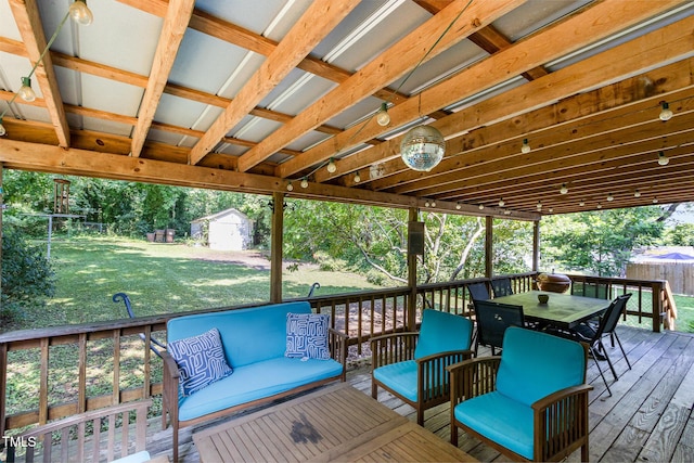 1701 Ruffin St, Durham, NC 27701 - wooden terrace featuring an outdoor hangout area, outdoor dining space, a fenced backyard, and a storage shed