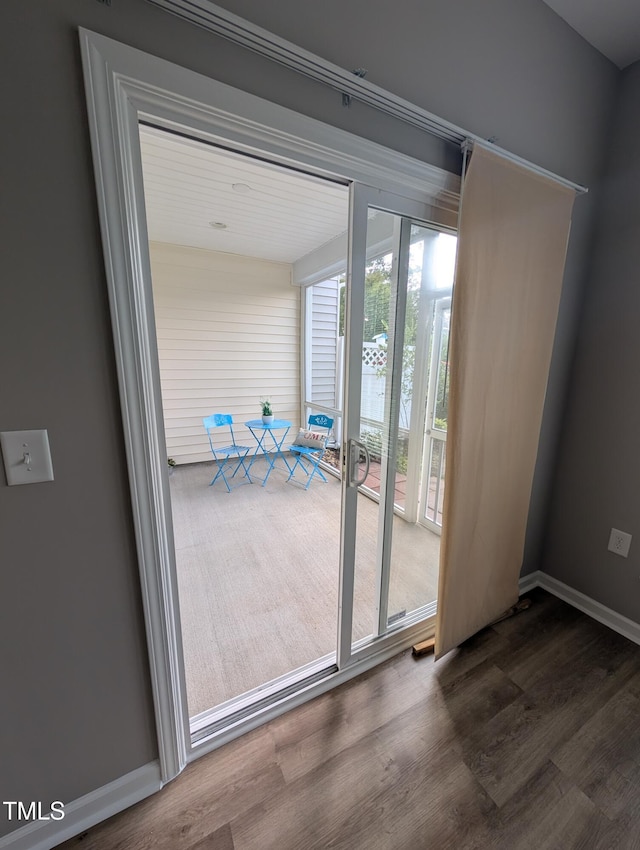 4221 Del Webb Ave, Cary, NC 27519 - doorway with wood finished floors and baseboards