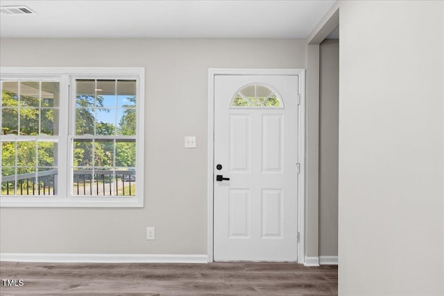 691 Oak Grove Rd, Roxboro, NC 27574 - foyer entrance with baseboards and wood finished floors