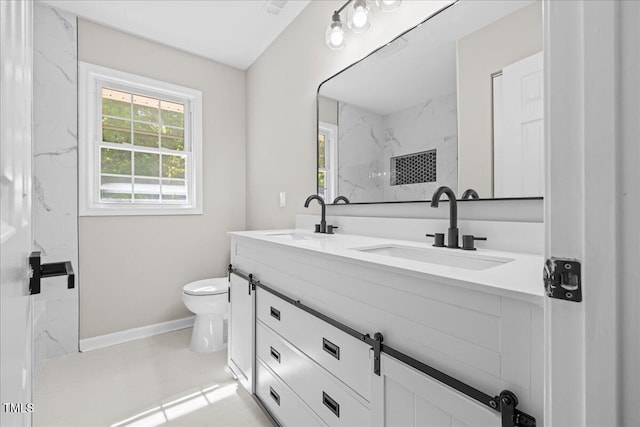 691 Oak Grove Rd, Roxboro, NC 27574 - bathroom with double vanity and toilet