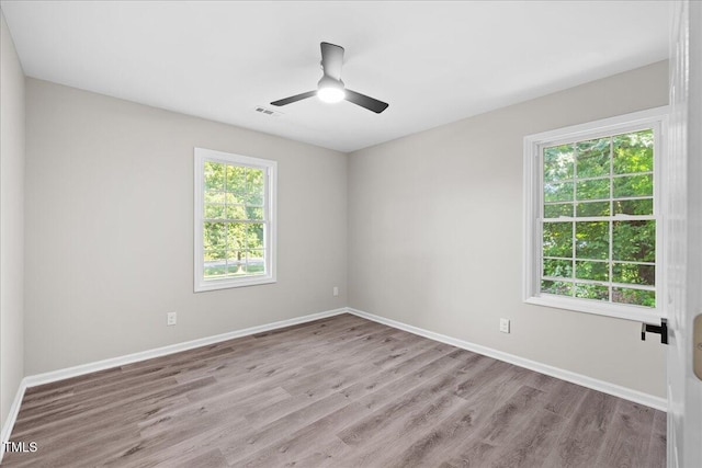 691 Oak Grove Rd, Roxboro, NC 27574 - unfurnished room featuring wood finished floors and ceiling fan
