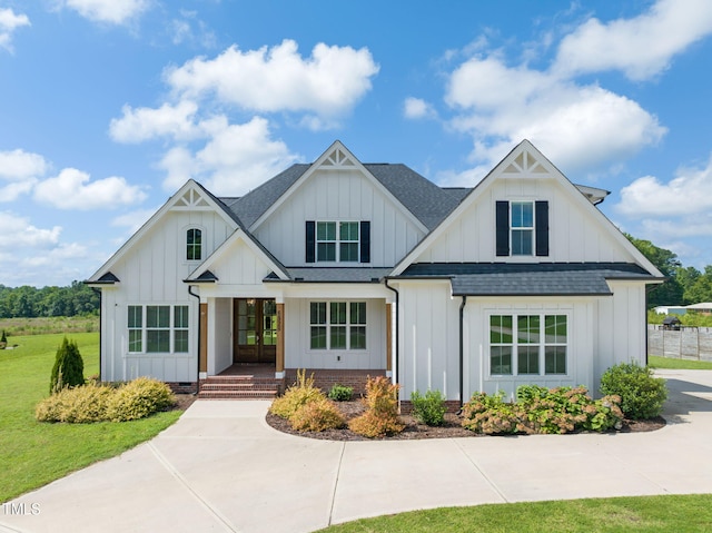 6928 Will Let Ln, Wake Forest, NC 27587 - modern inspired farmhouse featuring roof with shingles, board and batten siding, and a porch