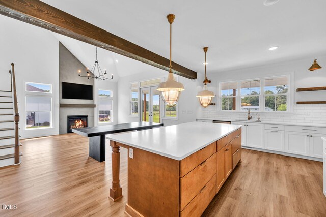 6928 Will Let Ln, Wake Forest, NC 27587 - kitchen featuring light wood-type flooring, tasteful backsplash, recessed lighting, healthy amount of natural light, and light countertops