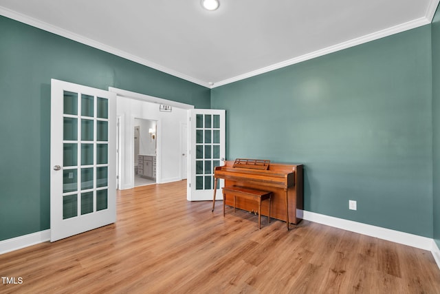 6928 Will Let Ln, Wake Forest, NC 27587 - spare room with french doors, ornamental molding, and wood finished floors