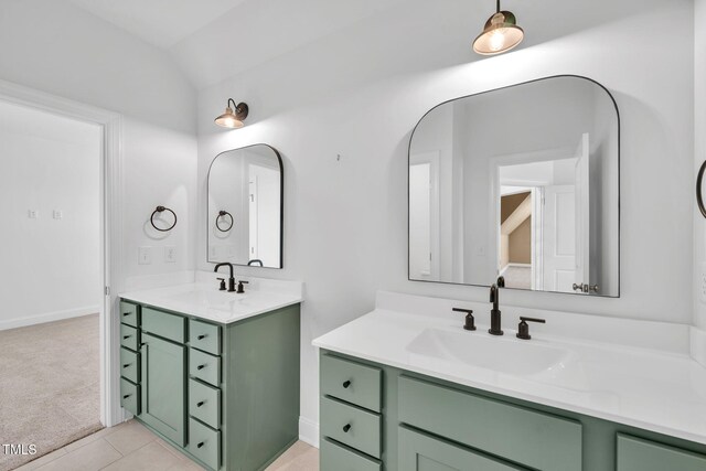 6928 Will Let Ln, Wake Forest, NC 27587 - full bathroom with two vanities, lofted ceiling, and tile patterned floors