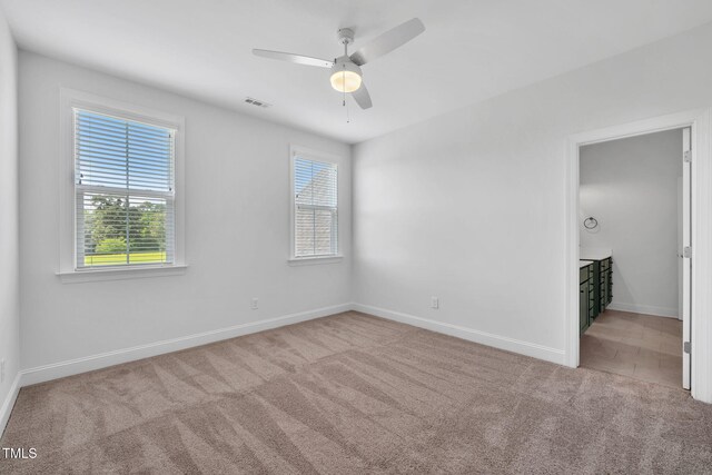 6928 Will Let Ln, Wake Forest, NC 27587 - carpeted empty room featuring plenty of natural light and a ceiling fan