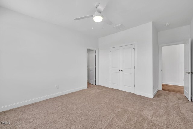 6928 Will Let Ln, Wake Forest, NC 27587 - unfurnished bedroom with carpet floors, a closet, and ceiling fan