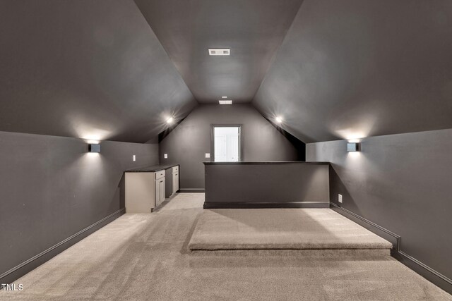 6928 Will Let Ln, Wake Forest, NC 27587 - home theater featuring light colored carpet and lofted ceiling
