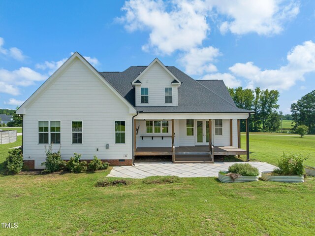 6928 Will Let Ln, Wake Forest, NC 27587 - rear view of property featuring french doors, a patio area, a lawn, and roof with shingles