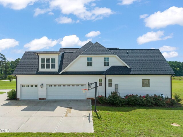 6928 Will Let Ln, Wake Forest, NC 27587 - traditional-style house with driveway, roof with shingles, an attached garage, and a front lawn